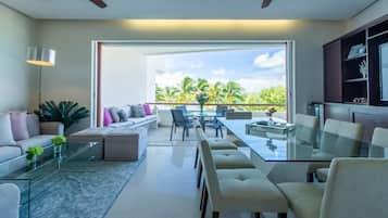 Luxury Apartment | Living area | 60-inch Smart TV with cable channels, TV, Netflix