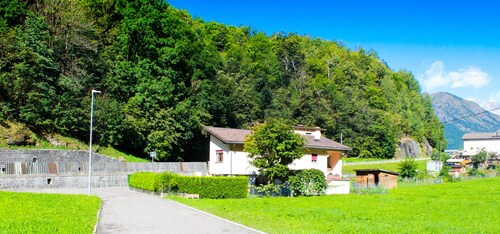 Cozy apartment with garden, veranda and mountain view