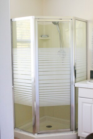 Shower, hair dryer, towels, soap