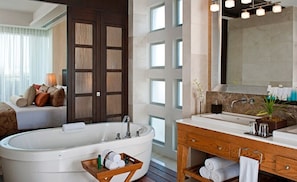 Shower, jetted bath, hair dryer, towels