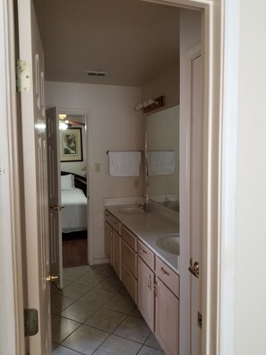 Bathtub, hair dryer, bidet, towels