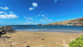 On the beach, sun-loungers, beach towels