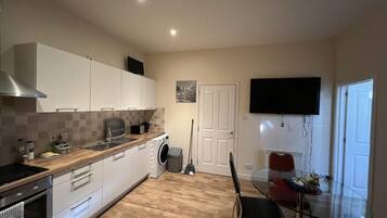 Apartment | Private kitchen | Fridge, microwave, oven, stovetop
