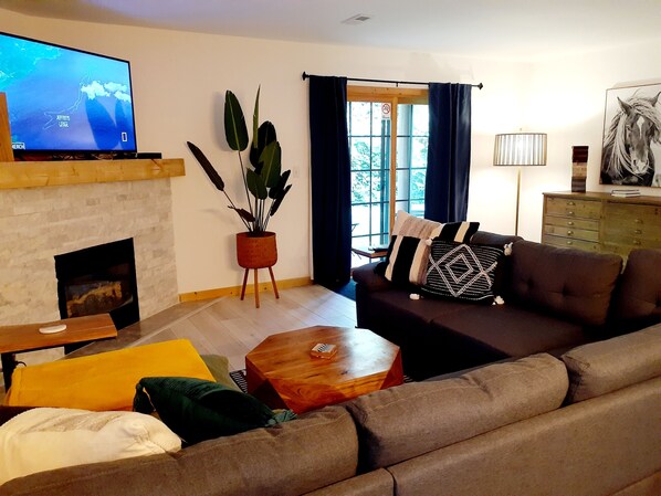 Smart TV, fireplace, books