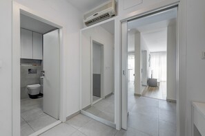 Bathtub, hair dryer, towels
