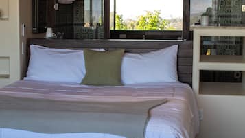 Premium bedding, minibar, blackout drapes, iron/ironing board