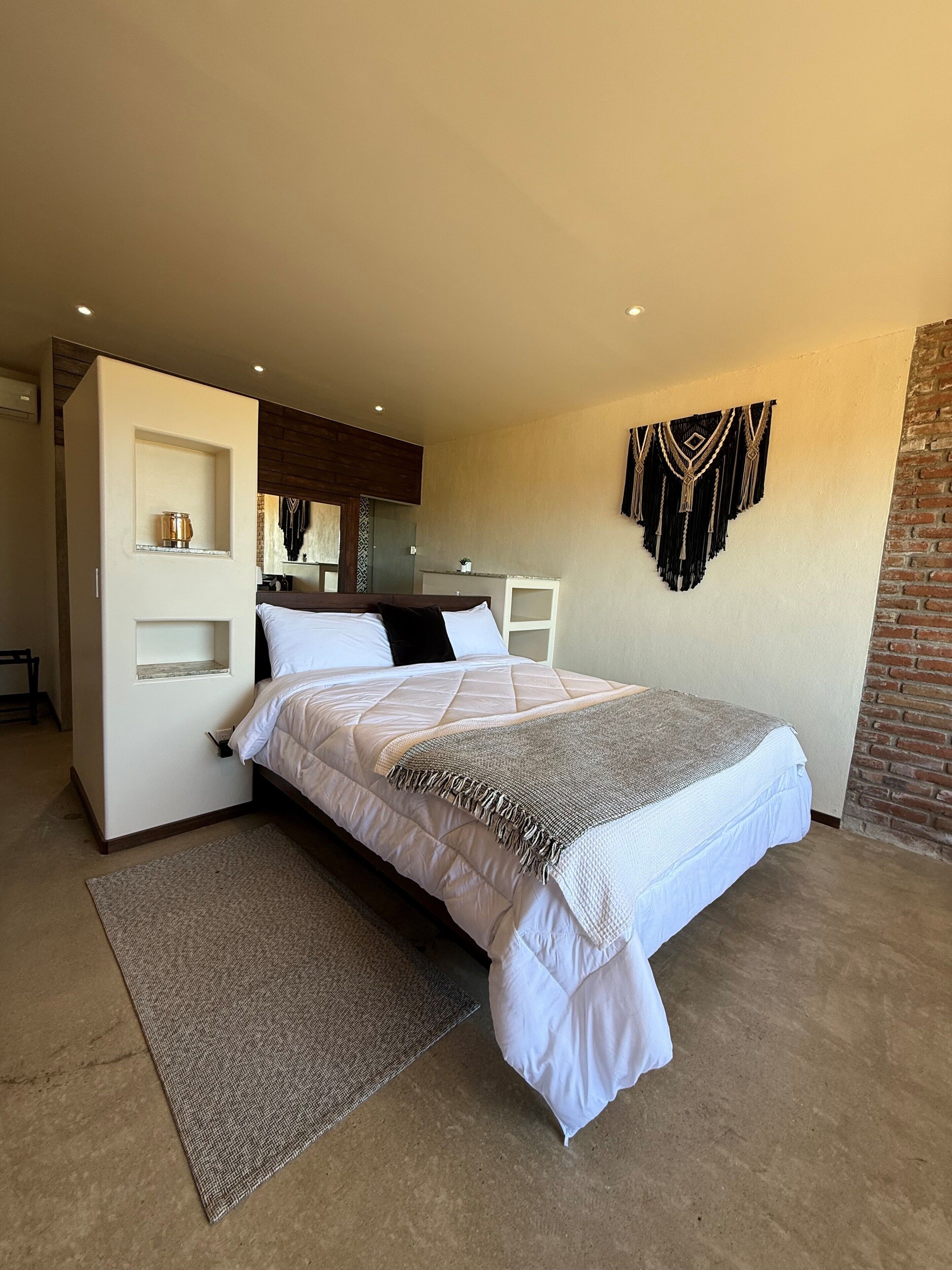 Premium bedding, minibar, blackout drapes, iron/ironing board