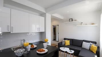 Apartment (Superior One-Bedroom Apt) | Living room | 25-inch flat-screen TV with cable channels, TV