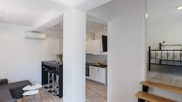 Apartment (Superior Two-Bedroom Apt) | Living room | 25-inch flat-screen TV with cable channels, TV