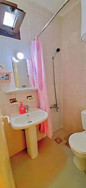 Shower, towels, soap, shampoo