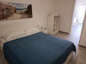 2 chambres, fer et planche à repasser, Wi-Fi, draps fournis