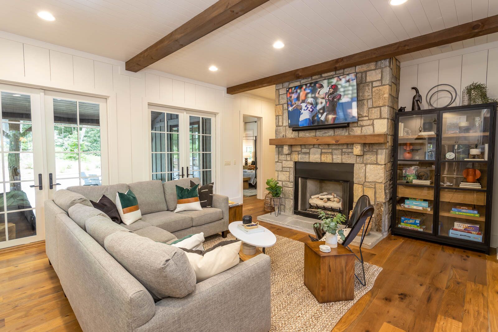 Flat-screen TV, fireplace, table football