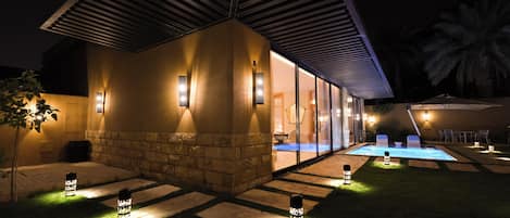 Economy Room, Patio, Pool View | 1 bedroom, minibar, individually furnished, desk