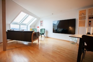 Apartamento urbano | Área de estar | Smart TV
