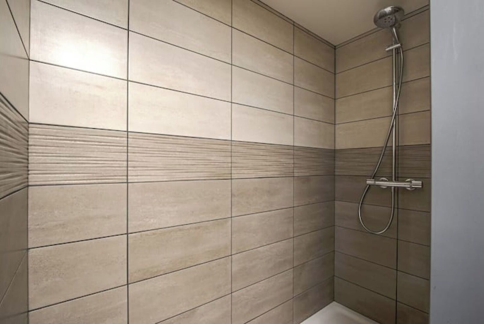 Shower, hair dryer, towels, toilet paper