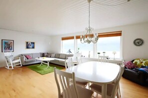 Standard Apartment | Living area | 40-inch flat-screen TV with cable channels - Liljulon - Views - Location (Ljosa)