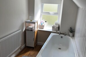 Cottage | Bathroom | Shower, deep soaking tub, hair dryer, towels