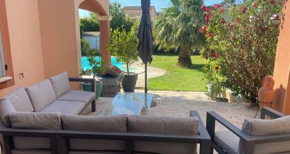 Air-conditioned room in spacious villa with swimming pool