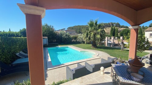 Air-conditioned room in spacious villa with swimming pool