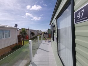 Cabin | Exterior - Sea and Mountain View Sunbeach Holiday Snowdonia (Llwyngwril)