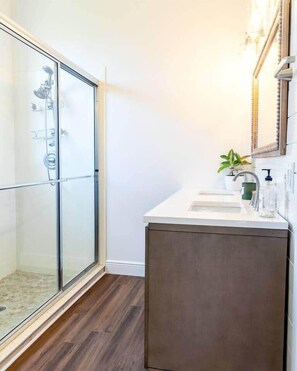 Combined shower/tub, hair dryer, towels, soap