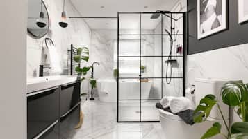 Luxury House | Bathroom | Separate bathtub and shower, hair dryer, towels, soap