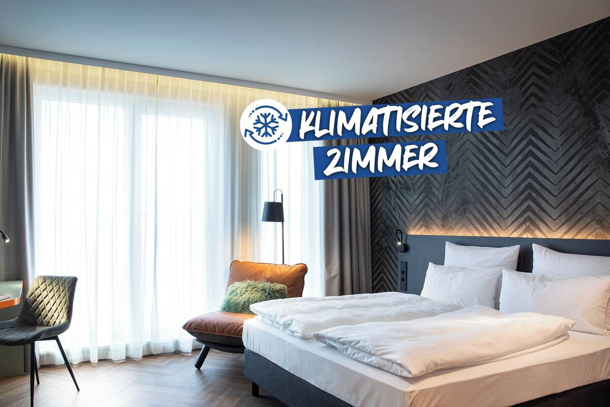 Business tweepersoonskamer | Een bureau, gratis wifi, beddengoed