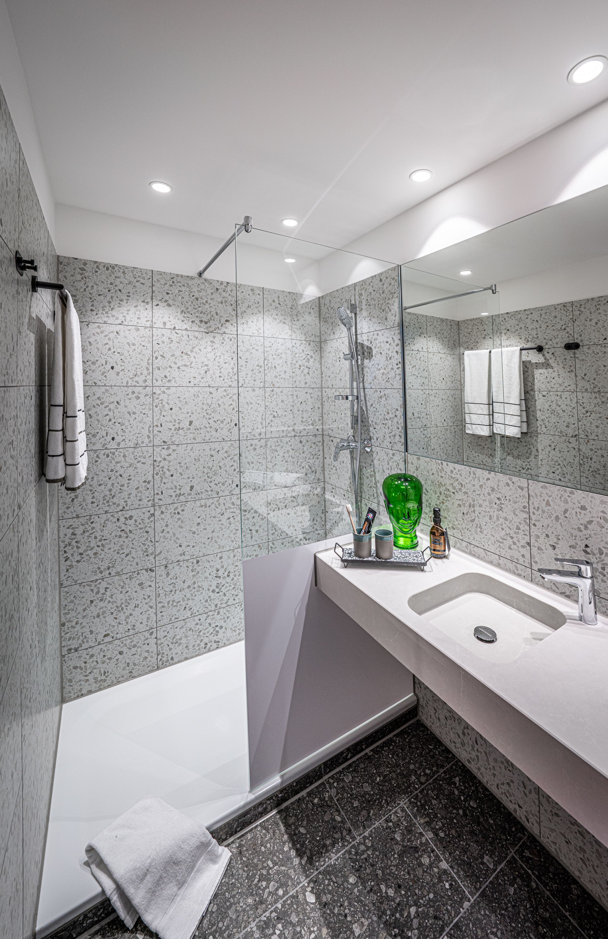 shower, eco-friendly toiletries, hair dryer, towels
