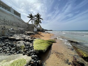 On the beach, sun-loungers, beach towels