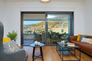 公寓 (2 Bedrooms) | 起居区 | 150-厘米纯平电视（配备有线频道）、电视、Netflix