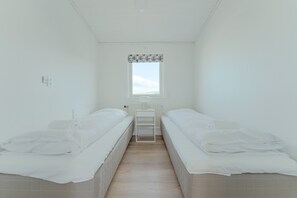 Apartament urbà | 5 dormitoris, roba de llit hipoal·lergògena i decoració individual