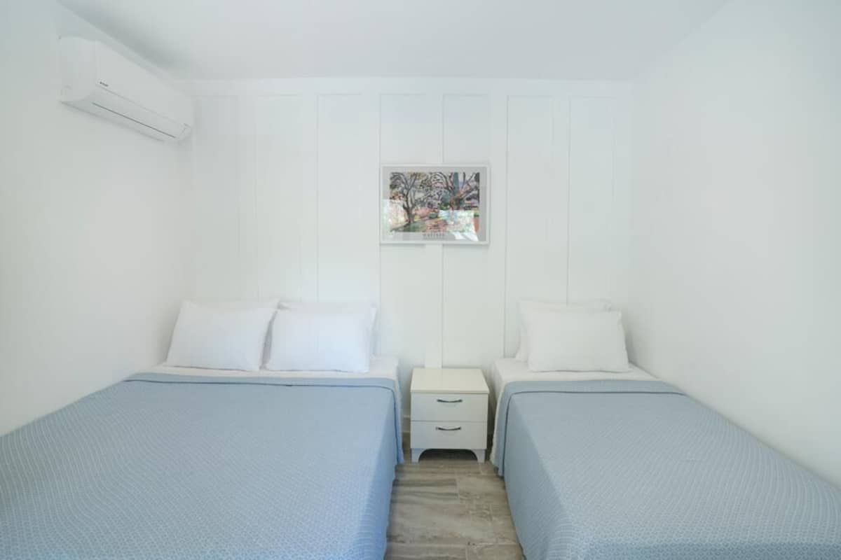Basic Triple Room | 2 bedrooms, in-room safe, soundproofing, bed sheets