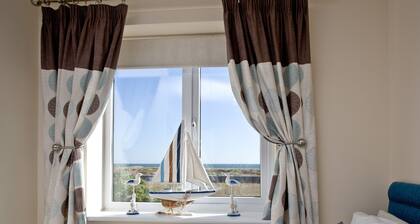 Steps From The Shore