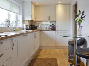 Dishwasher, high chair - 4 bedroom accommodation in Rhosybol, near Amlwch (Rhosybol, near Amlwch)