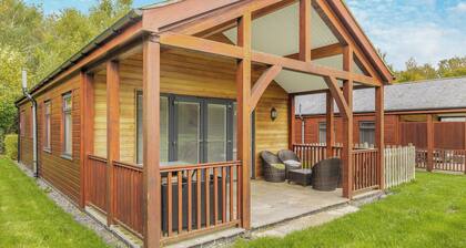 Enjoy a summer BBQ in the lawned garden.