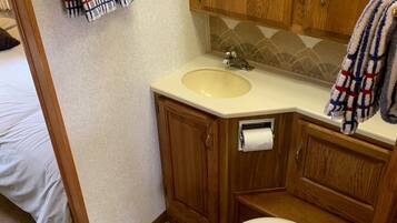 Shower, towels, soap, shampoo