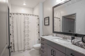 Combined shower/tub