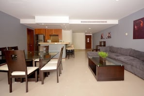 Deluxe Apartment | Living area | Flat-screen TV, Netflix, streaming services