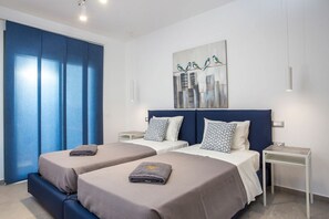 4 habitaciones, tabla de planchar con plancha, wifi y ropa de cama 