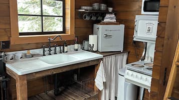 Fridge, microwave, stovetop, coffee/tea maker