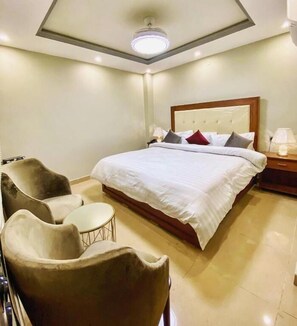 Deluxe Double Room | Iron/ironing board, free WiFi, bed sheets - Grand luxury Hotel (Multan)
