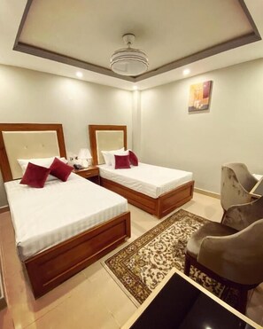 Superior Twin Room | Iron/ironing board, free WiFi, bed sheets - Grand luxury Hotel (Multan)