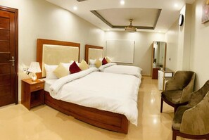 Executive Triple Room | Iron/ironing board, free WiFi, bed sheets - Grand luxury Hotel (Multan)