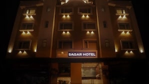 A multi-story building with a sign reading "Sagar Hotel". - Sagar Residency (Amritsar)