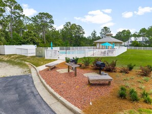 A pool area with a gazebo, a barbecue grill, and a patio with benches. - 2 Blocks 2 Beach, Walk to Seaside, Pool, Beach Gear, New Kitchen (Santa Rosa Beach)