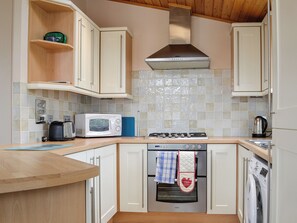 Periquera y utensilios de cocina 