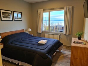 Verduisterende gordijnen, gratis wifi, beddengoed