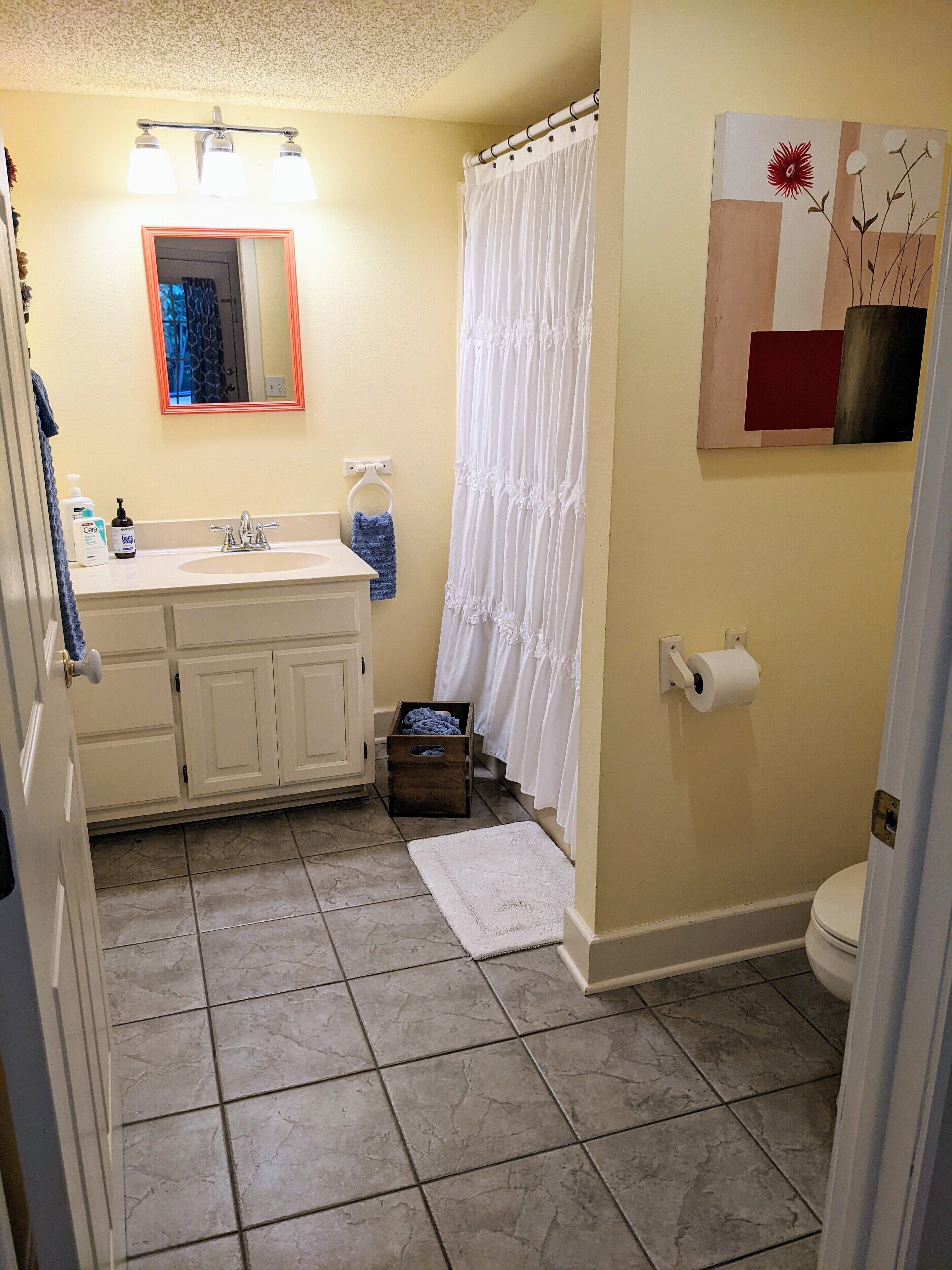 Combined shower/tub, hair dryer, towels, soap