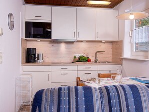 Microwave, toaster, high chair