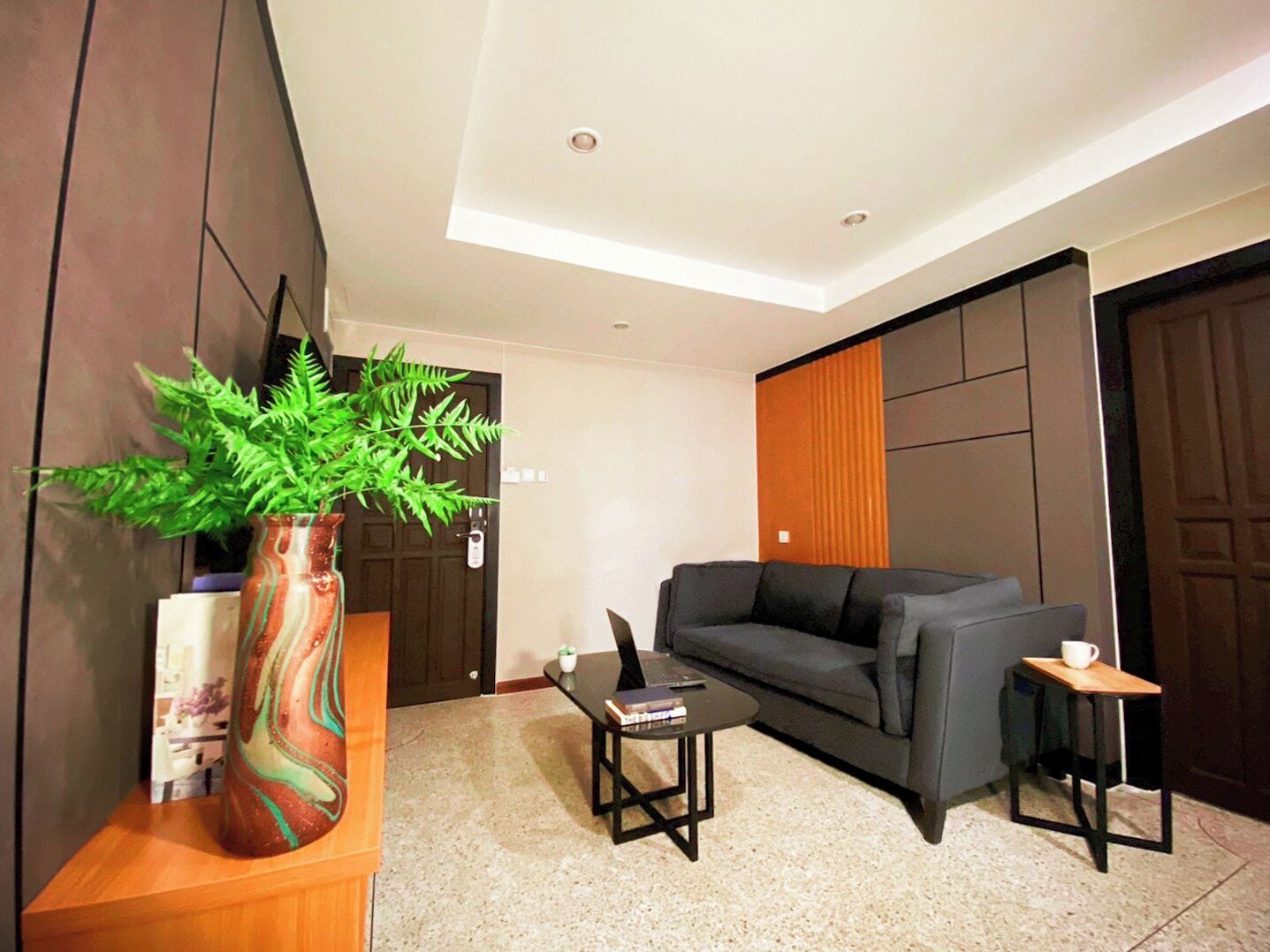 junior room, 1 bedroom, non smoking, city view | living room | 39-inch smart tv with digital channels, tv, books